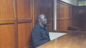 Fred Obach Oliech at the Milimani Law Courts where he was charged over a KES 29 million fake gold deal.