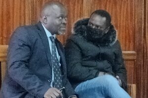 Man charged with murdering university lecturer
