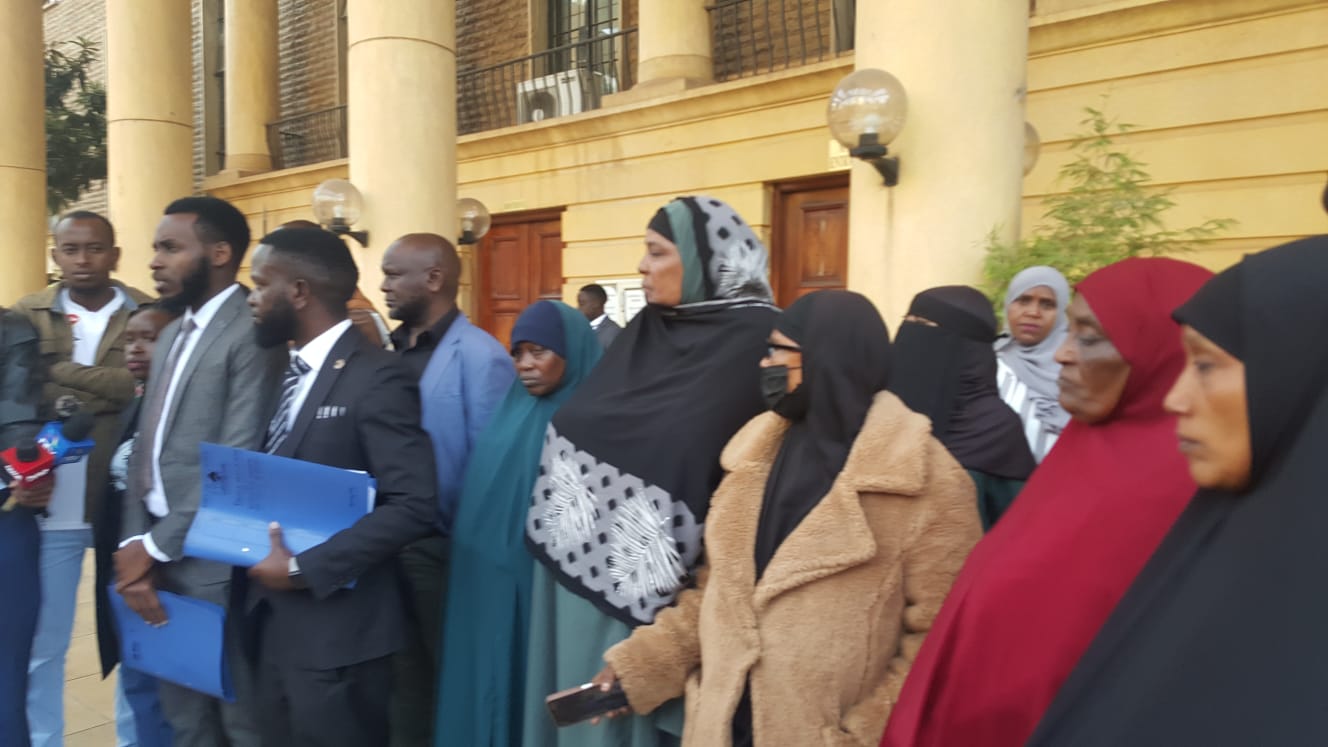 Parents of four men who were allegedly abducted by police and bundled into Subaru cars,