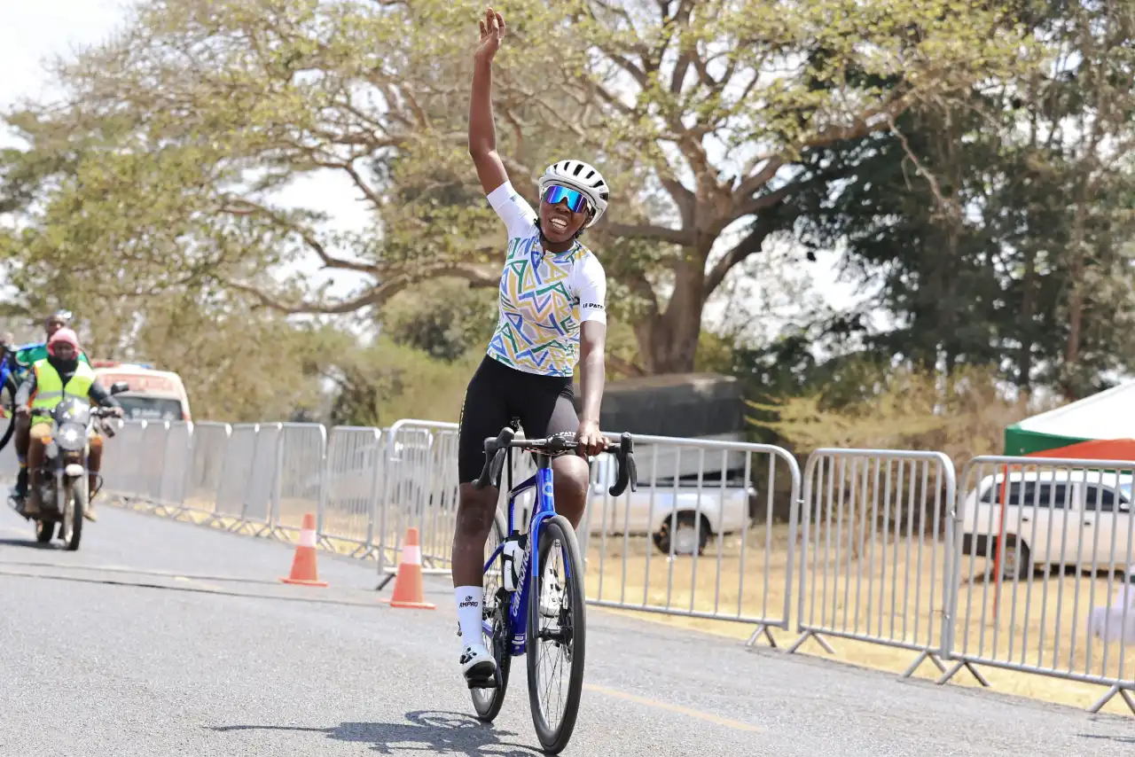 Cyclist Akimana Donatha from Rwanda celebrate’s winning women’s 60km race. 