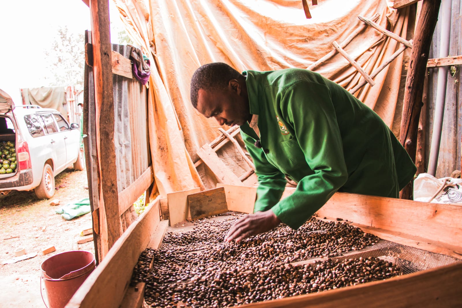 Patrick Mutahi, the founder and director of Mukurwe-ini Oil Enterprises Limited, showcase some of the products at the facility. 