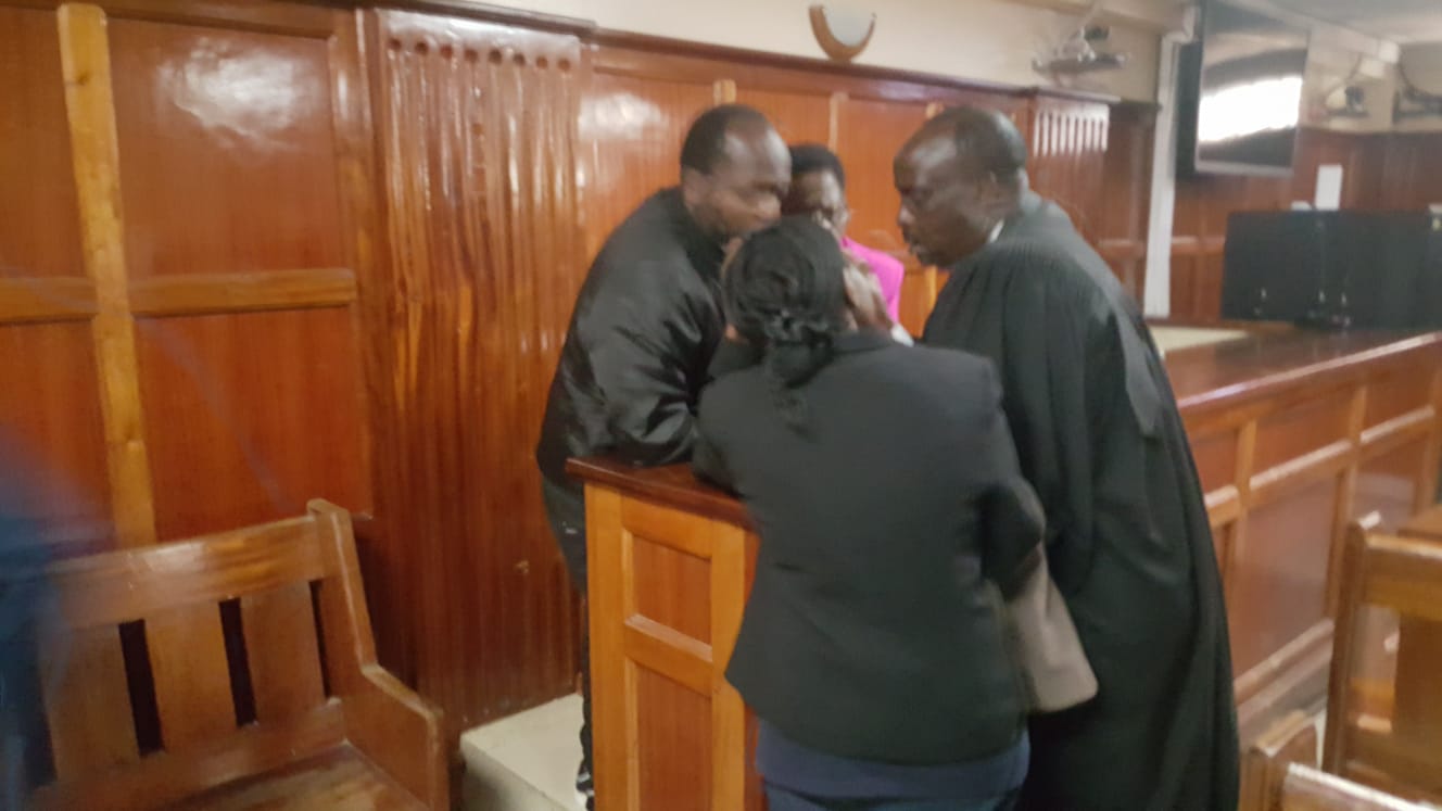 Danstan Omari with Rose Mbithe  and her two children Chris and Angella at the Milimani  HIgh where they were arraigned over Dr Victoria Mutiso on July 29, 2026