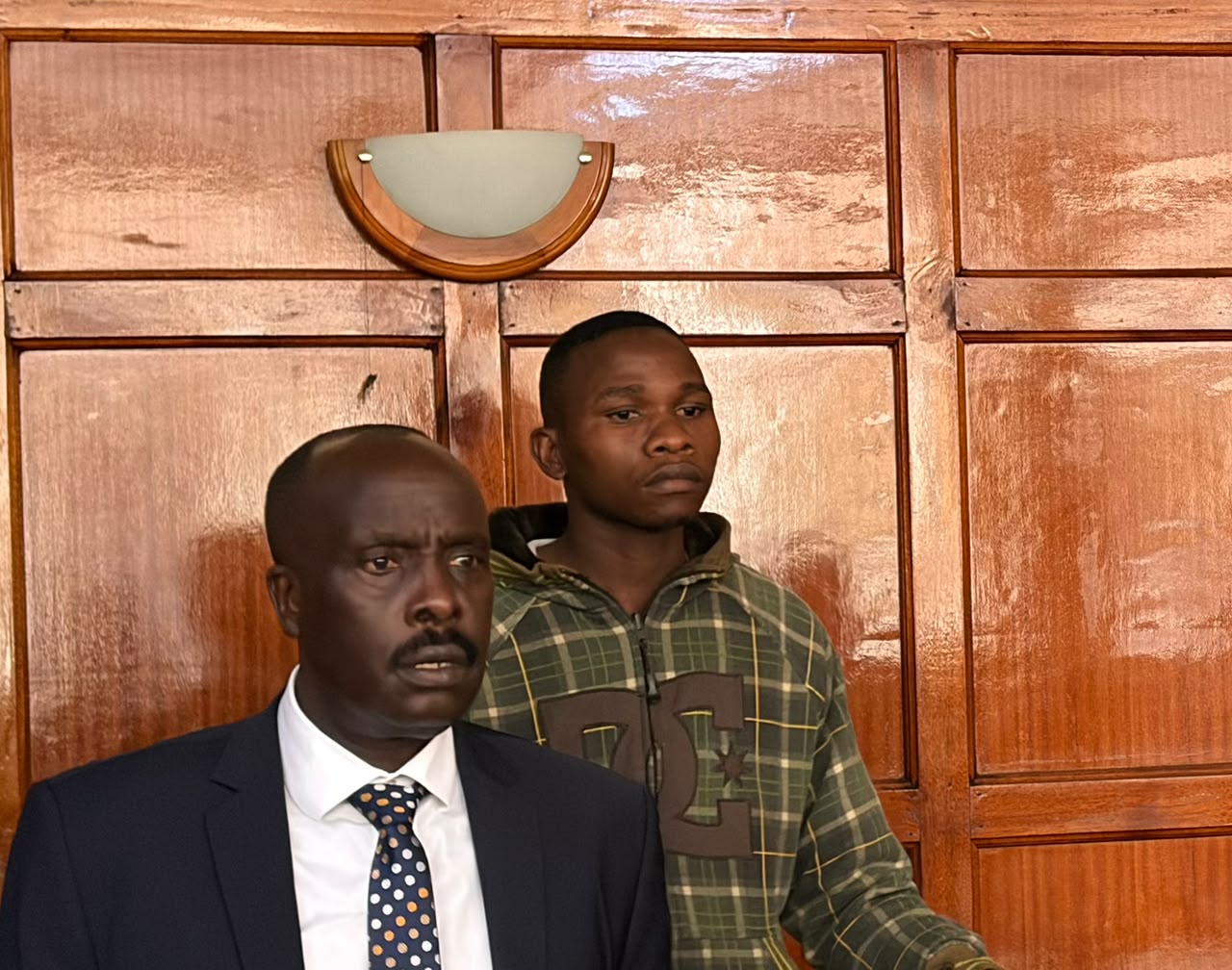 Hesbon Mauti Thomas (right) with his lawyer Danstan Omari at the Milimani Law Court on July 31, 2026, where he was charged with allegedly using offensive language against President William Ruto and his family. 