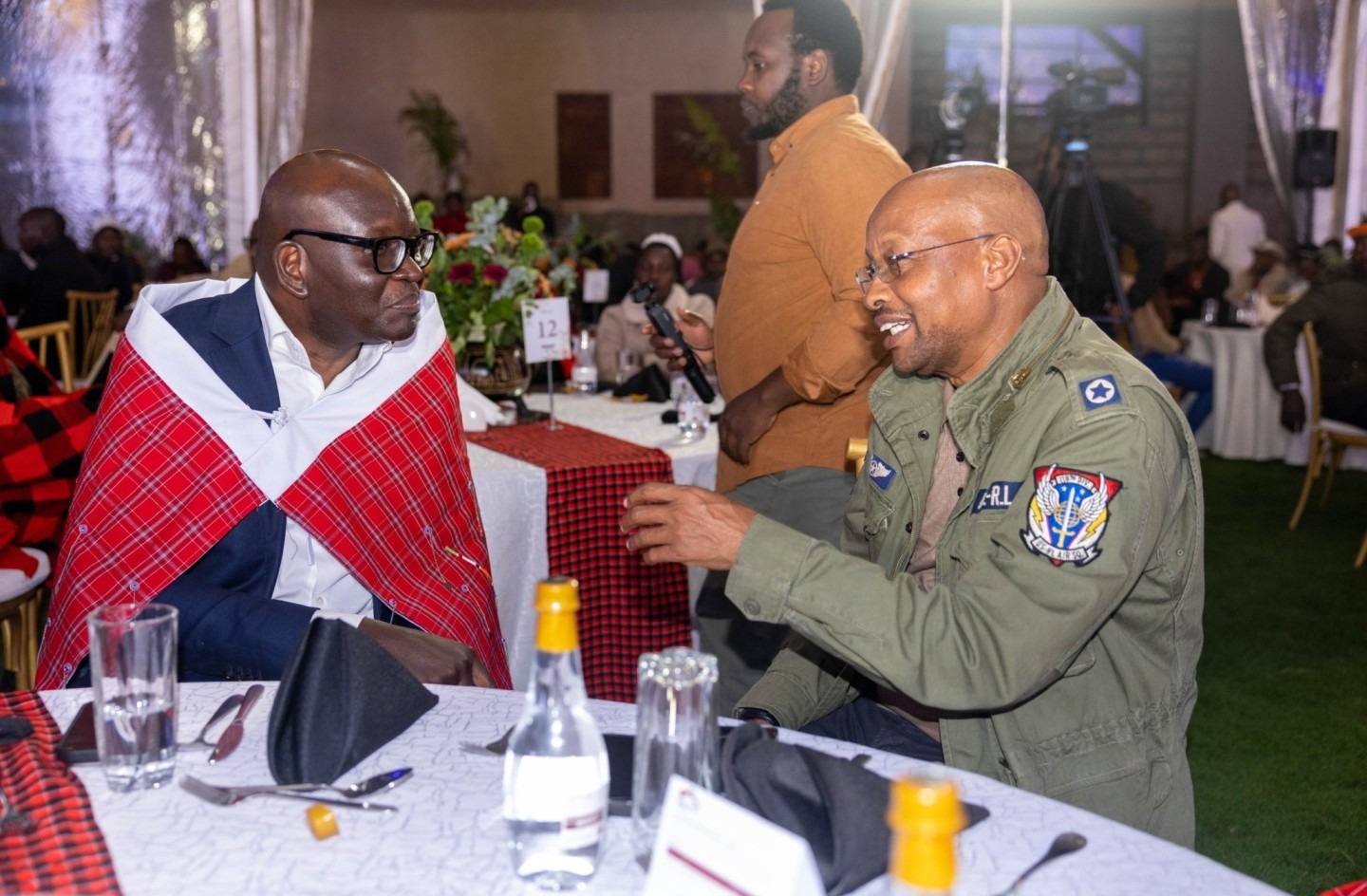 Narok County Executive Committee Member for Finance, David Ole Muntet and Moses Nyabanda, Equity Bank MD interact at a dinner held between Equity Bank’s executive leadership, the Narok County Government, and the local business community. 