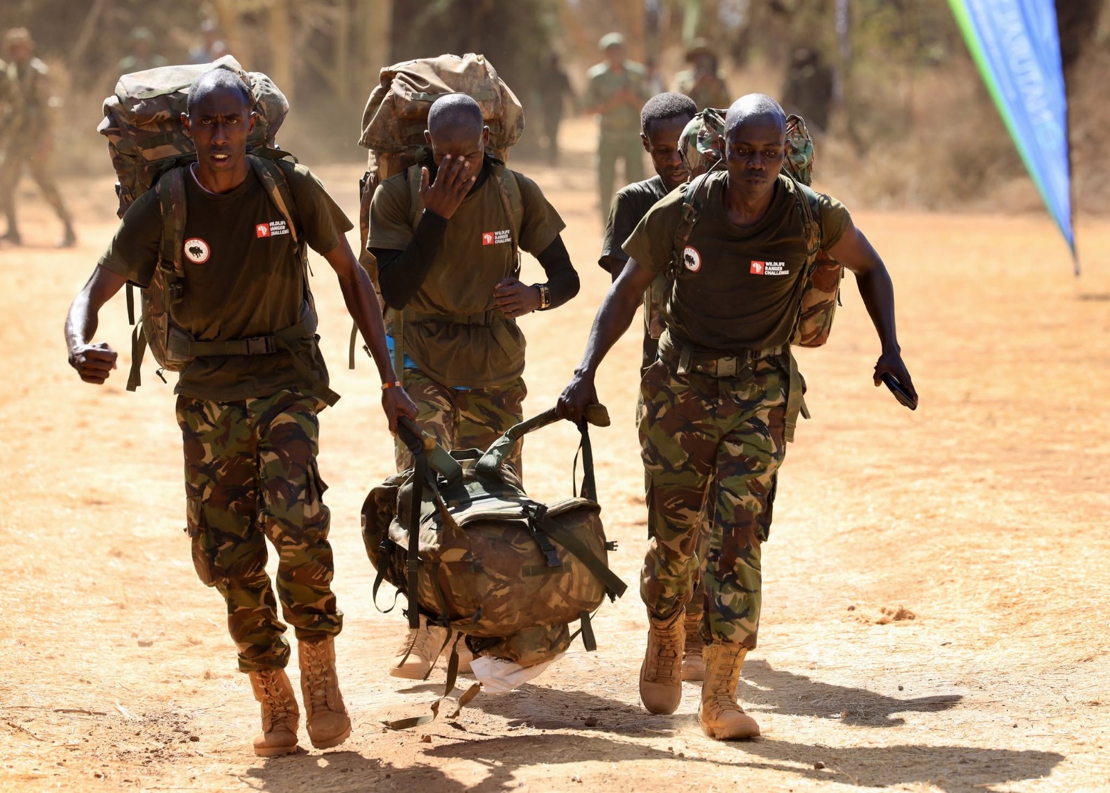 Some of the over 2,000 rangers from across 21 African countries who took part in synchronised 21km races, carrying up to 22kg of kit. 