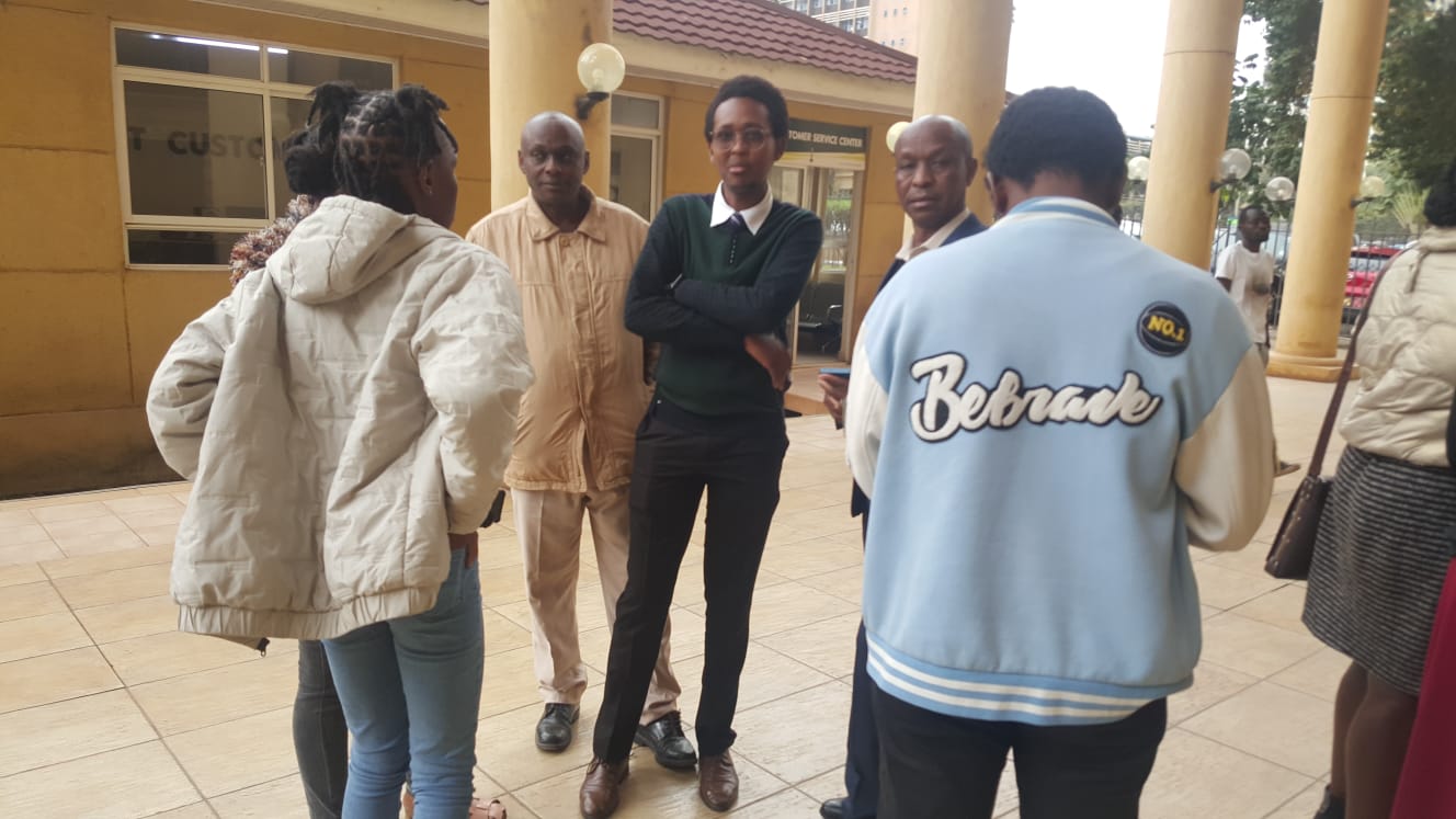 Relatives of the four abducted men at Mathare slums by allegedly by police two months ago consult at the Milimani High Court on August 17, 2027, after the mention of their case. 