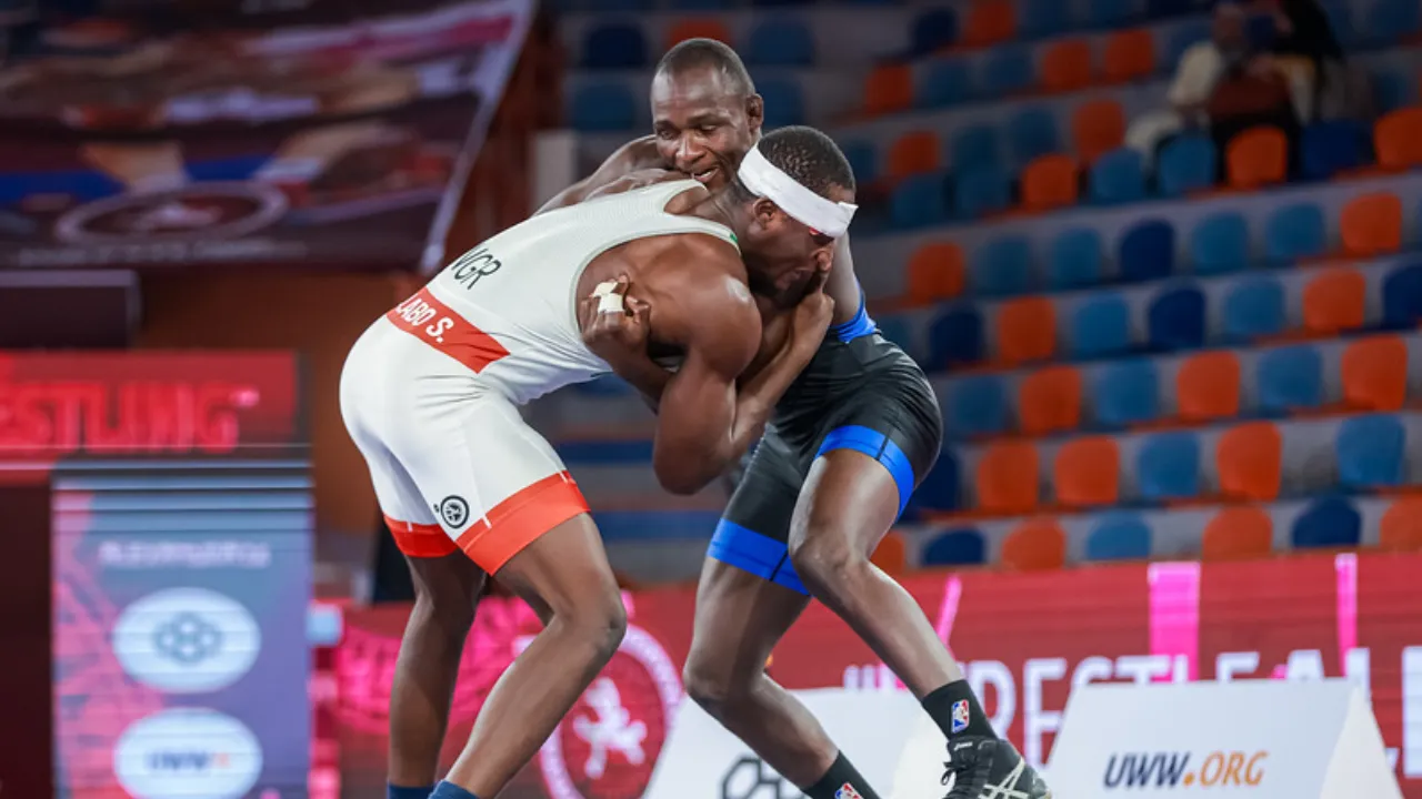Mahabila Mathayo (in black) wrestles at the 2026 U17, U20, Senior African Wrestling Championships in Egypt.
